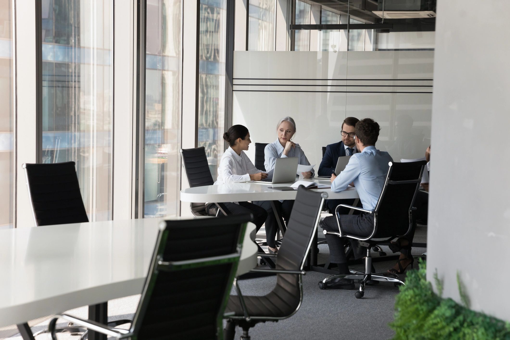 Professionals collaborating during a training planning session