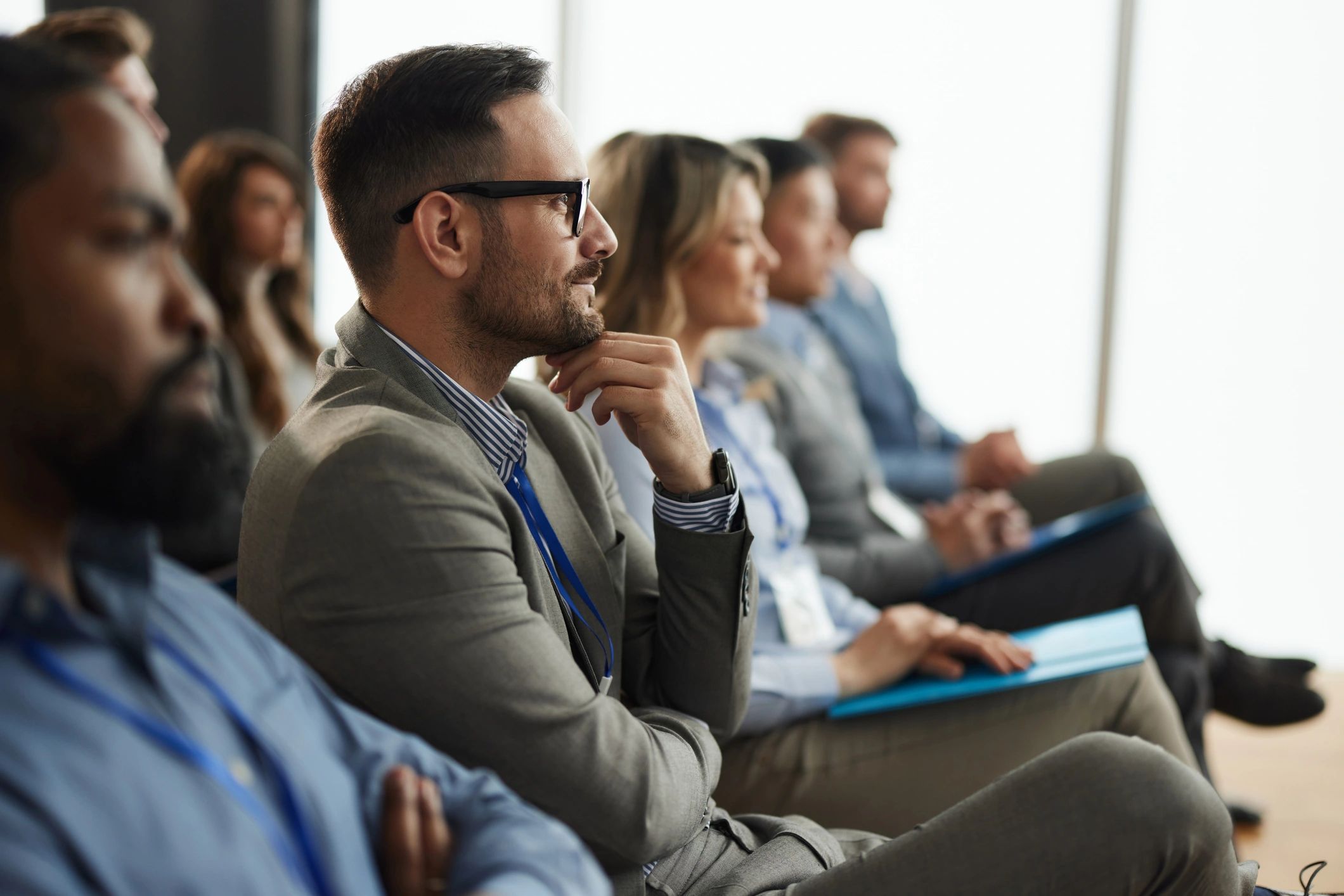 Professional attendee smiling during a seminar